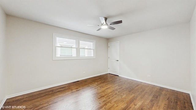 3524 N Natoma Ave, Chicago, IL 60634 - unfurnished room featuring baseboards, wood finished floors, and a ceiling fan