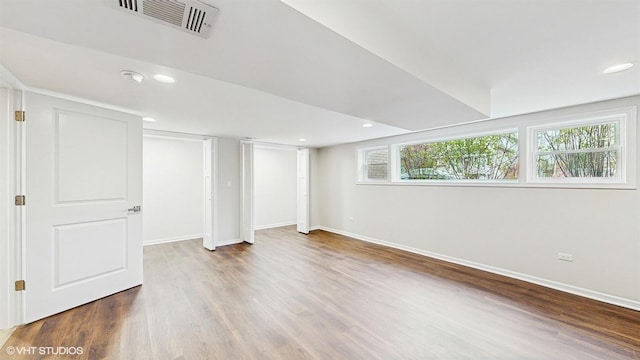 3524 N Natoma Ave, Chicago, IL 60634 - basement featuring wood finished floors, baseboards, and recessed lighting