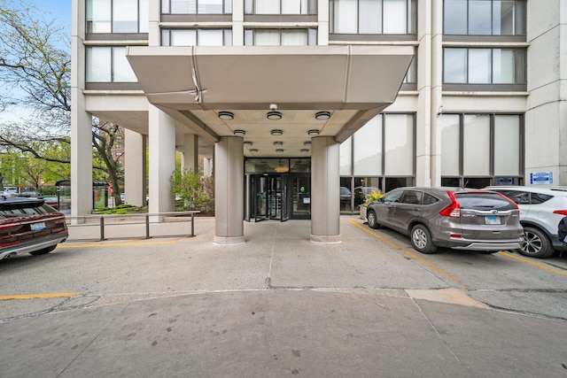 5455 N Sheridan Rd Unit 3804, Chicago, IL 60640 - view of exterior entry with uncovered parking
