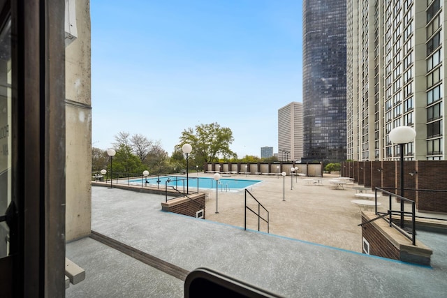 community pool featuring a patio