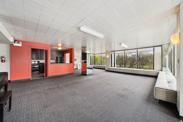 5455 N Sheridan Rd Unit 3804, Chicago, IL 60640 - unfurnished living room featuring carpet flooring