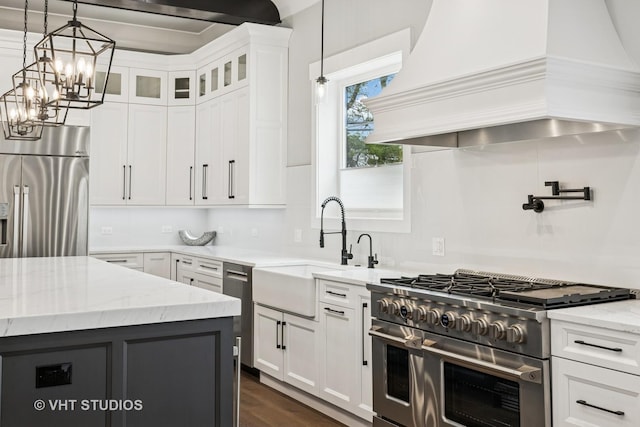 3701 Knollwood Ln, Glenview, IL 60025 - kitchen with appliances with stainless steel finishes, custom exhaust hood, a sink, light stone countertops, and white cabinets