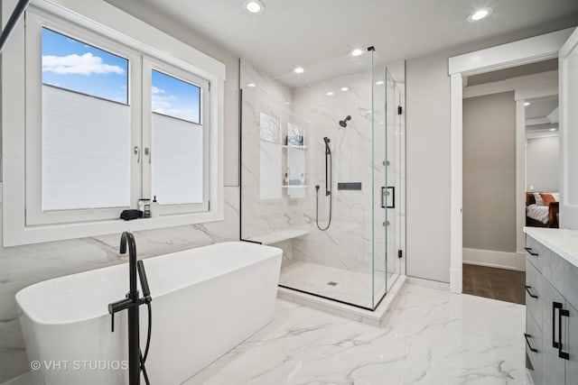 3701 Knollwood Ln, Glenview, IL 60025 - full bathroom featuring recessed lighting, marble tiled flooring, a marble finish shower, a freestanding tub, and vanity