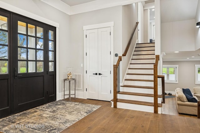 3701 Knollwood Ln, Glenview, IL 60025 - foyer entrance featuring wood finished floors, stairs, baseboards, and recessed lighting