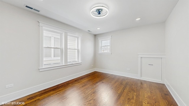 5524 W Byron St, Chicago, IL 60641 - unfurnished room featuring wood finished floors, baseboards, and recessed lighting