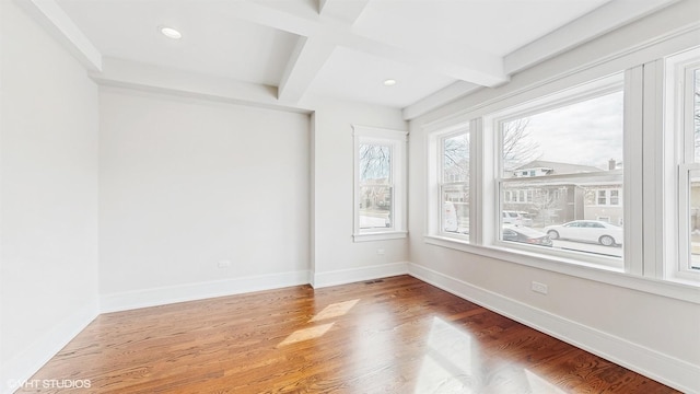 5524 W Byron St, Chicago, IL 60641 - empty room with beam ceiling, wood finished floors, baseboards, and recessed lighting