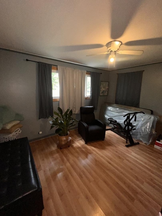bedroom with wood finished floors and ceiling fan