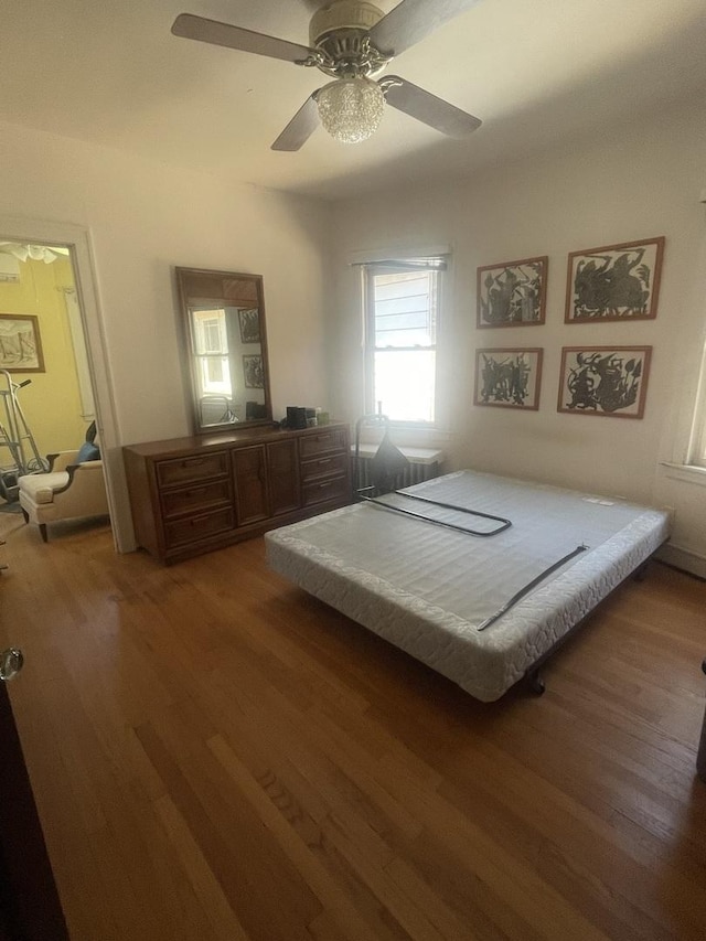 6108 N Maplewood Ave, Chicago, IL 60659 - bedroom with wood finished floors and ceiling fan