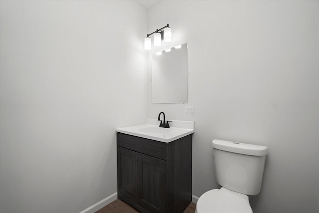 13723 S Springfield Ave, Robbins, IL 60472 - bathroom featuring vanity and wood finished floors