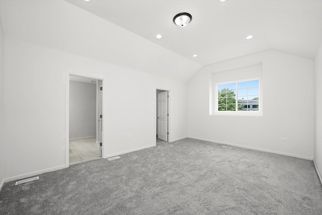 13723 S Springfield Ave, Robbins, IL 60472 - additional living space with lofted ceiling, carpet, and recessed lighting
