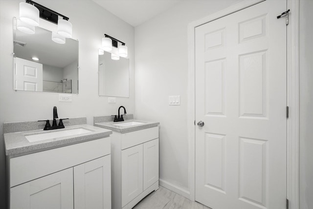 13723 S Springfield Ave, Robbins, IL 60472 - full bath featuring marble finish flooring and two vanities