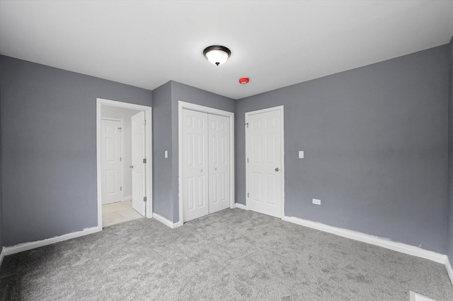 13723 S Springfield Ave, Robbins, IL 60472 - unfurnished bedroom featuring carpet flooring and a closet