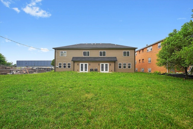 13723 S Springfield Ave, Robbins, IL 60472 - rear view of house featuring french doors and a yard