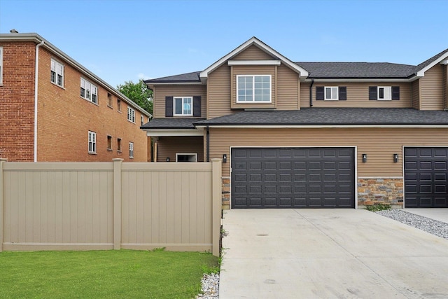 13723 S Springfield Ave, Robbins, IL 60472 - view of front of property with driveway, an attached garage, stone siding, and a shingled roof