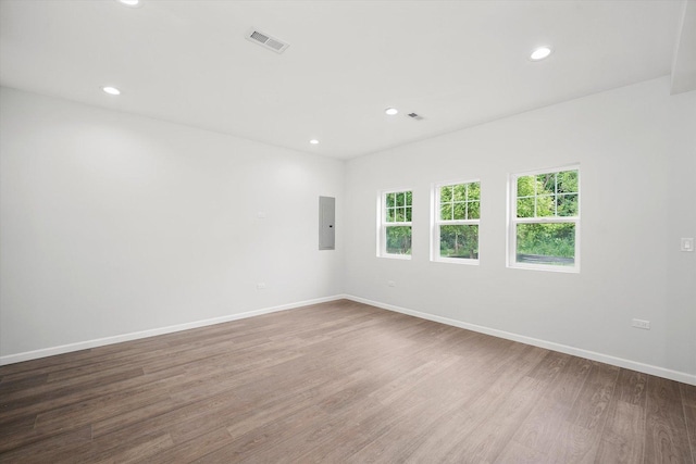 13723 S Springfield Ave, Robbins, IL 60472 - spare room featuring electric panel, recessed lighting, and wood finished floors