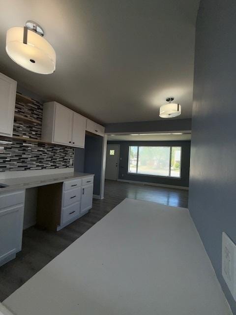 17545 Burnham Ave, Lansing, IL 60438 - kitchen featuring decorative backsplash, white cabinets, wood finished floors, and light countertops