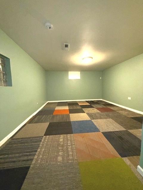 17545 Burnham Ave, Lansing, IL 60438 - empty room featuring baseboards and a smoke detector