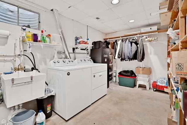 laundry area featuring washer and dryer and recessed lighting