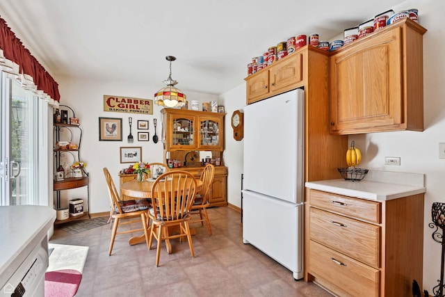 dining space with baseboards