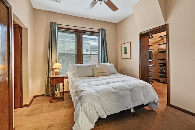 1050 W Buena Ave Unit 1A, Chicago, IL 60613 - bedroom with light carpet, baseboards, a ceiling fan, and a closet