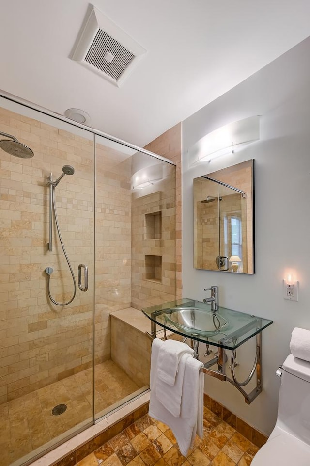 1050 W Buena Ave Unit 1A, Chicago, IL 60613 - bathroom featuring a stall shower and toilet