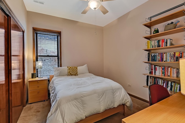 1050 W Buena Ave Unit 1A, Chicago, IL 60613 - bedroom with light colored carpet, a ceiling fan, and baseboards