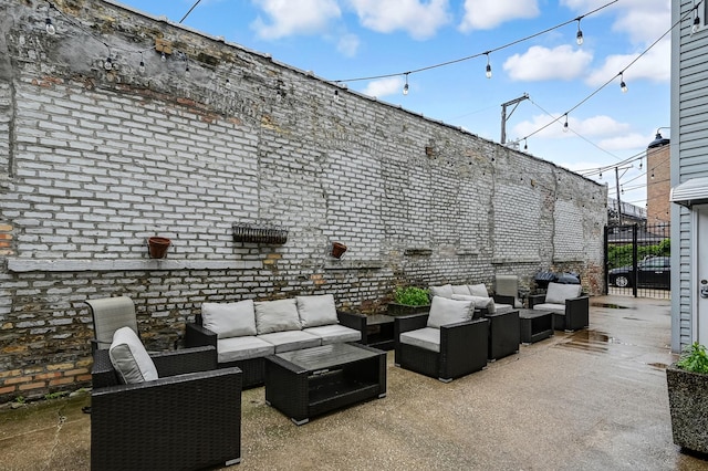 1050 W Buena Ave Unit 1A, Chicago, IL 60613 - view of patio with outdoor lounge area and a gate