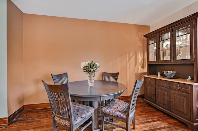 1050 W Buena Ave Unit 1A, Chicago, IL 60613 - dining area featuring dark wood-style flooring and baseboards