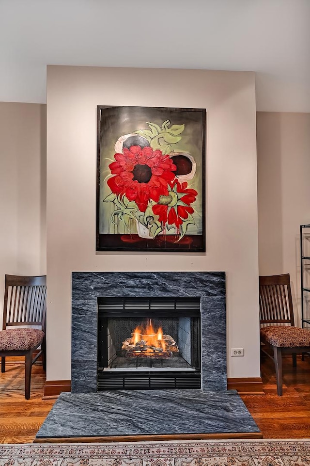 1050 W Buena Ave Unit 1A, Chicago, IL 60613 - detailed view of wood finished floors, a high end fireplace, and baseboards