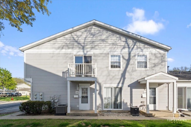642 Gray Ct Unit 0, Wheeling, IL 60090 - rear view of property with a balcony, central AC, and a patio