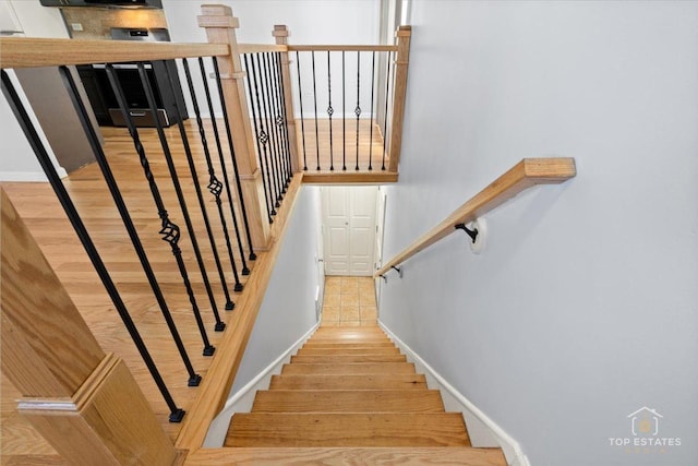 642 Gray Ct Unit 0, Wheeling, IL 60090 - stairway featuring wood finished floors and baseboards