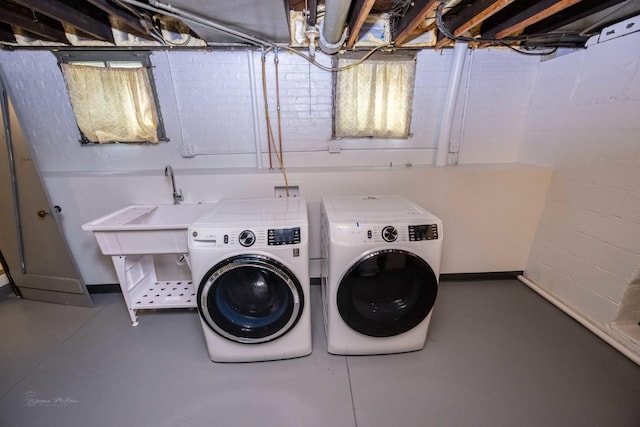 washroom with separate washer and dryer