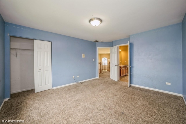 3140 Juniper Ct, Lynwood, IL 60411 - unfurnished bedroom with a closet, carpet floors, and baseboards