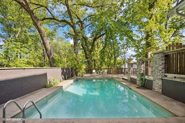 1124 Blackhawk Ave, Mchenry, IL 60051 - view of swimming pool with a fenced backyard