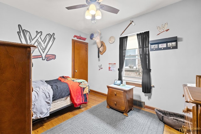 4112 N Mcvicker Ave, Chicago, IL 60634 - bedroom featuring wood finished floors, baseboards, and ceiling fan