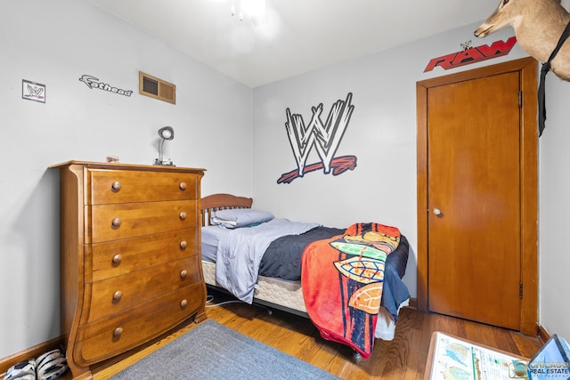 4112 N Mcvicker Ave, Chicago, IL 60634 - bedroom featuring wood finished floors