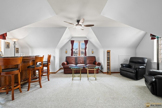 4112 N Mcvicker Ave, Chicago, IL 60634 - carpeted living area with ceiling fan, bar area, baseboards, and lofted ceiling