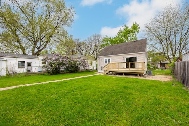 436 S Mckinley Ave, Kankakee, IL 60901 - rear view of property with a wooden deck and central AC