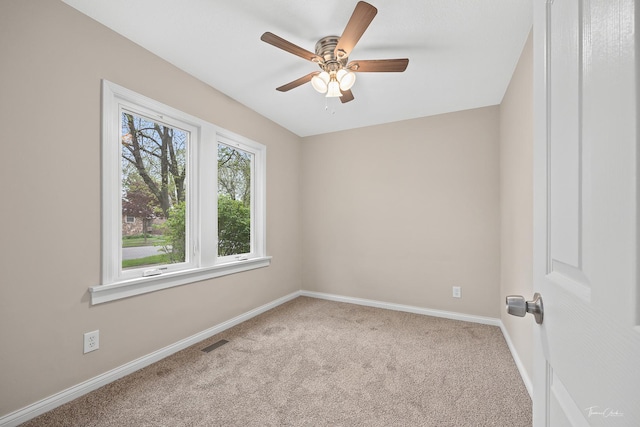 436 S Mckinley Ave, Kankakee, IL 60901 - carpeted spare room with baseboards and ceiling fan