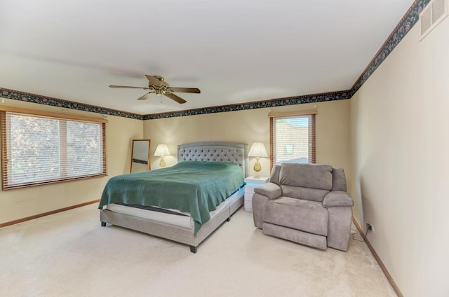 bedroom featuring carpet flooring, baseboards, and ceiling fan