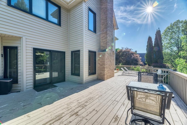 deck with outdoor dining space