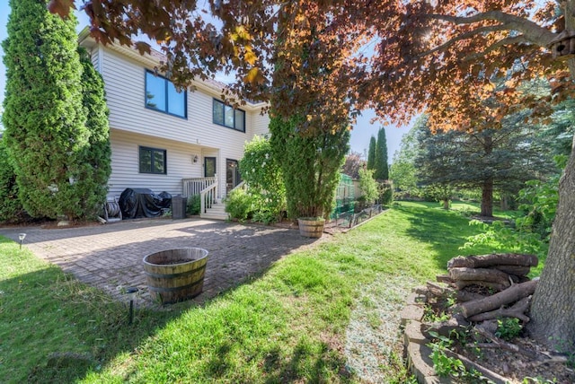 view of yard with a patio area