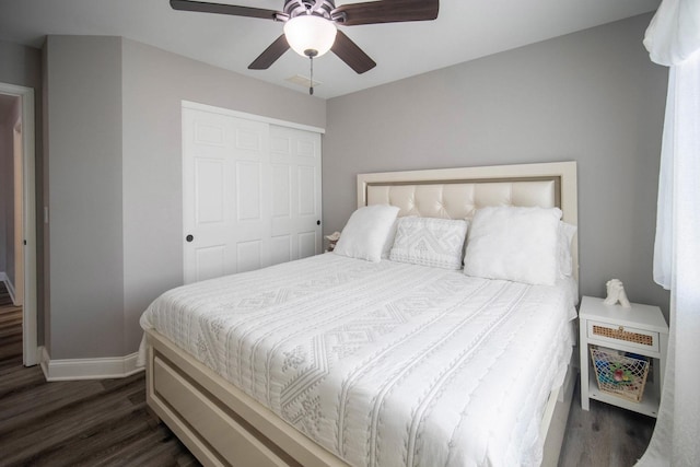 2650 Carlisle Ln, Hampshire, IL 60140 - bedroom with dark wood finished floors, baseboards, a closet, and a ceiling fan