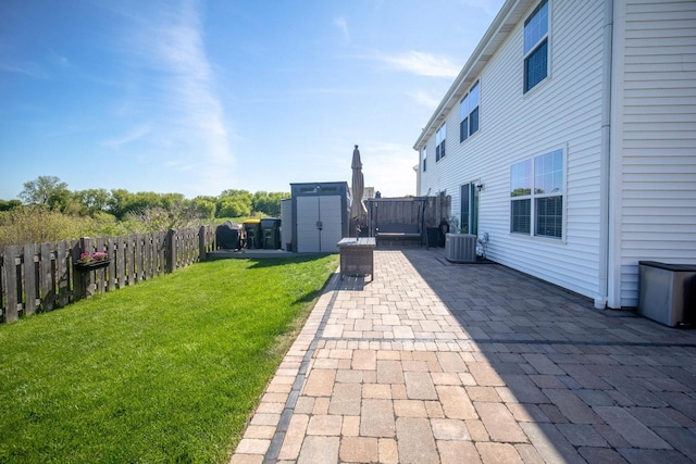 2650 Carlisle Ln, Hampshire, IL 60140 - view of yard with a patio, a storage shed, central AC, and an outdoor structure