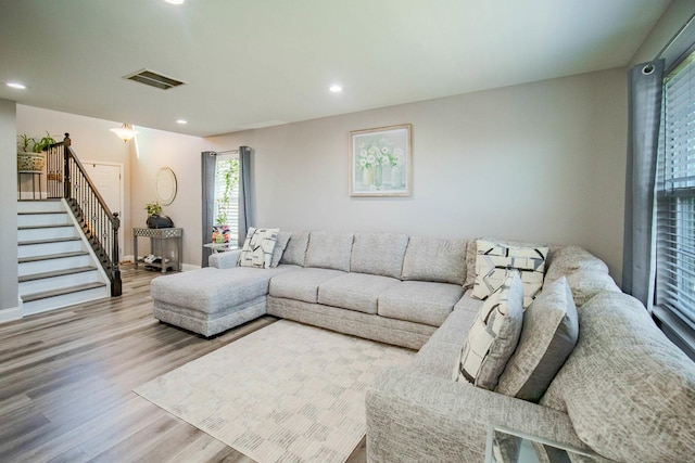 2650 Carlisle Ln, Hampshire, IL 60140 - living room featuring stairs, wood finished floors, and recessed lighting