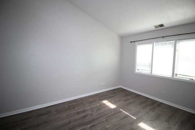 13340 S Oakview Ct Unit V2, Palos Heights, IL 60463 - empty room with dark wood-type flooring, lofted ceiling, and baseboards