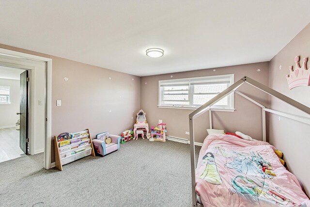 7715 W Patterson Ave, Chicago, IL 60634 - carpeted bedroom with a baseboard radiator, multiple windows, and baseboards