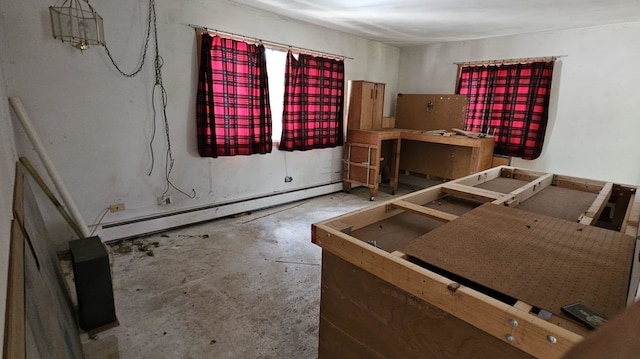 422 Ryerson Ave, Elgin, IL 60123 - bedroom featuring a baseboard radiator and unfinished concrete floors