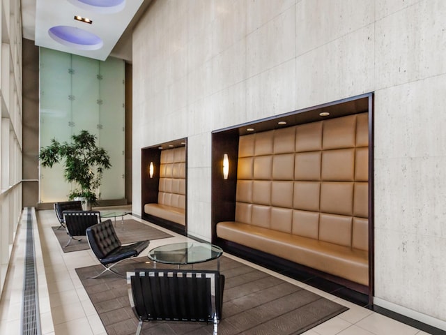 community lobby with a high ceiling