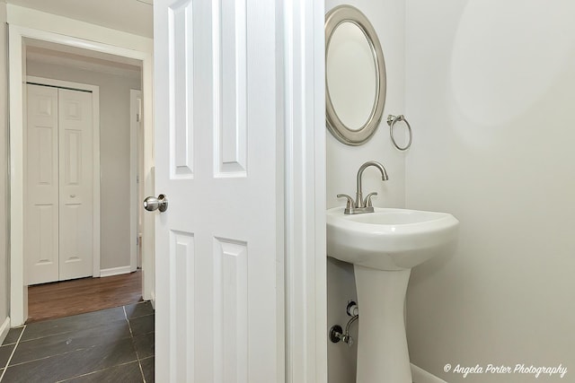 5305 N Highland Dr, Mchenry, IL 60050 - bathroom with baseboards and wood finished floors